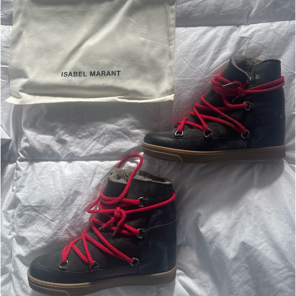 ISABEL MARANT
Nowles shearling-trimmed leather ankle boots, 41.